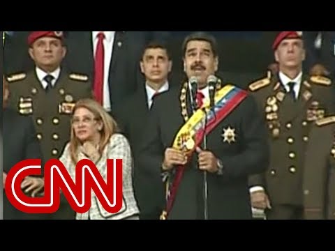 Venezuelan President Nicolas Maduro evacuated from stage